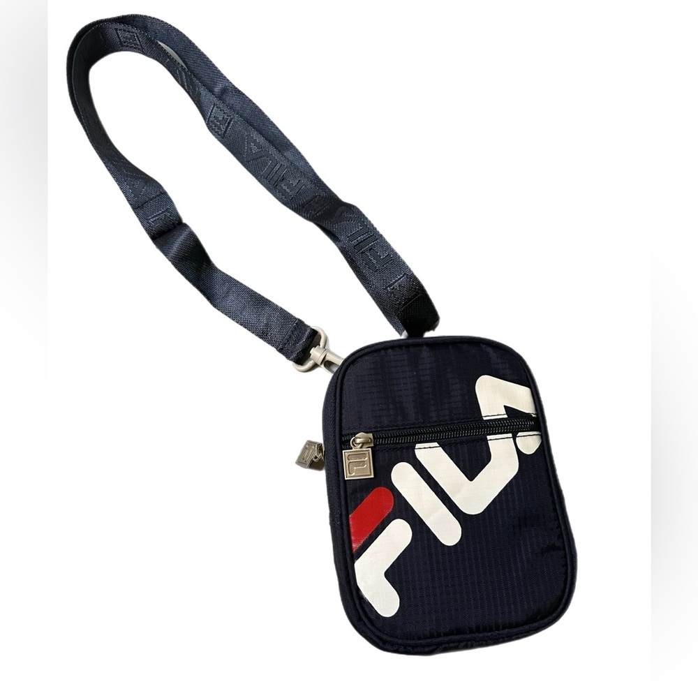 Fila blue crossbody with logo and zippers for storage, NWOT